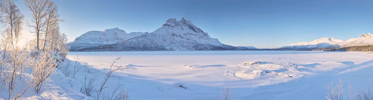 Lake Skoddeberg with the majestic mountain Nova in the background.